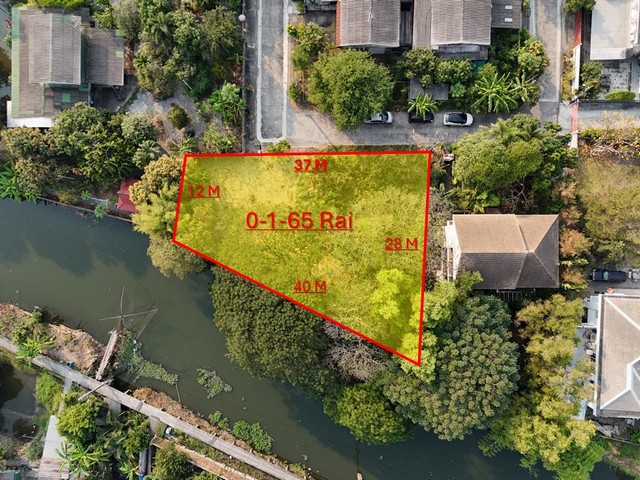 ขายที่ดินหมู่บ้านนักกีฬา กรุงเทพกีฑา ติดถนนติดคลอง หน้ากว้าง พร้อมต้นไม้ใหญ่ทรงสวย 