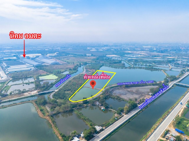 ขายที่ดินผังเมืองสีม่วงจุดขาว สร้างโรงงาน . โกดัง เนื้อที่ 10 ไร่เศษ ที่ดินมีไฟฟ้าสามเฟส ผ่านหน้าแปลงที่ดินแล้วที่ดินเป็นบ่อ อยู่ในซอยเนินสระ 25 มีหน้ากว้างติดถนนสาธารณะ  85  เมตร ถนนซอยสาธารณะหน้าแปลงที่ดิน กว้าง  6  เมตร ซึ่งมีระยะห่างเพียง  200  เมตร จะเชื่อมเข้าถนนเลียบคลองส่งน้ำ กว้าง  8  เมตรจากตำแหน่งที่ดินเชื่อมต่อเข้าสู่ ถนนมอเตอร์เวย์สาย 7 ด้วยระยะทางเพ�